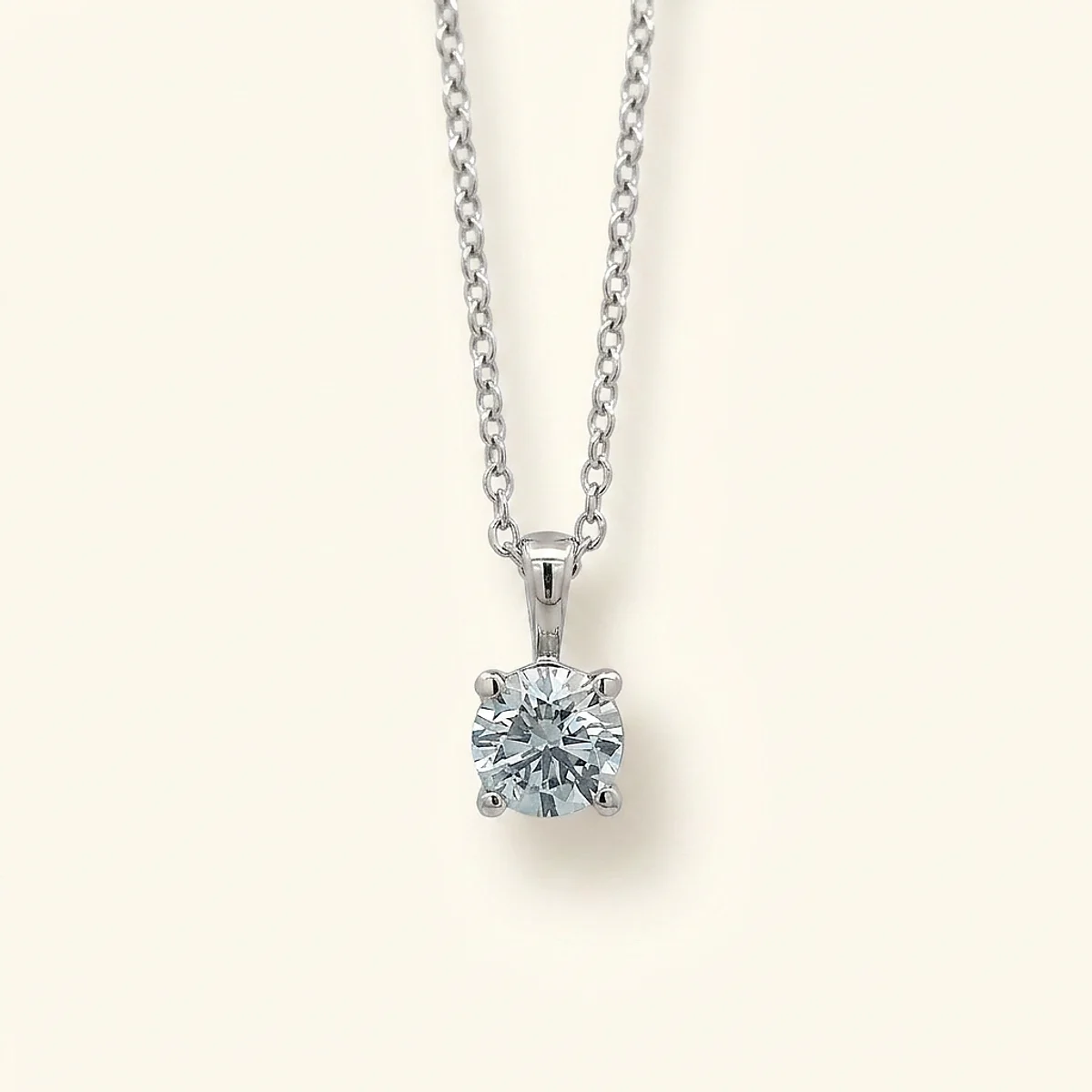 A .5ct blue round diamond on a white gold necklace, custom-designed by Eterneva to honor the remarkable Christopher.