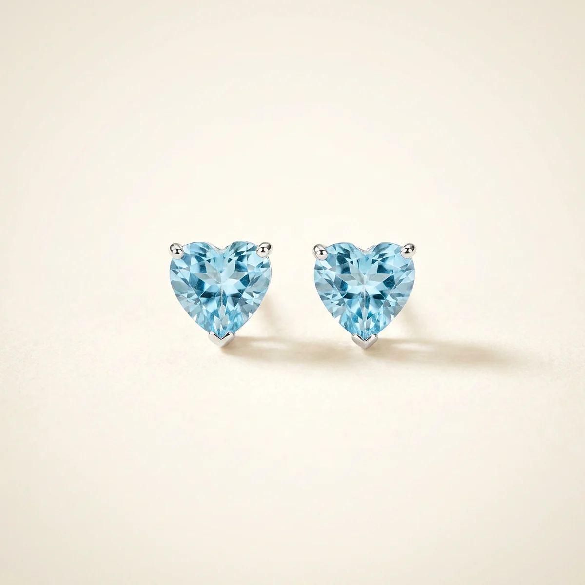 A .25ct blue heart diamond on platinum earrings, custom-designed by Eterneva to honor the remarkable James.