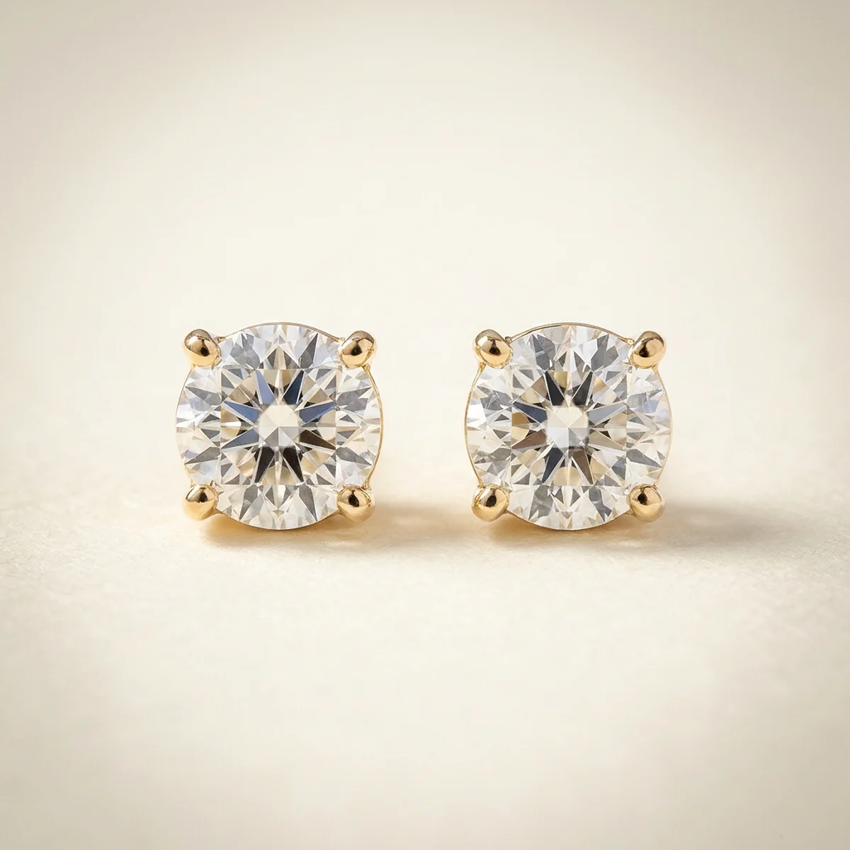 A .25ct colorless round diamond on yellow gold earrings, custom-designed by Eterneva to honor the remarkable Graham.