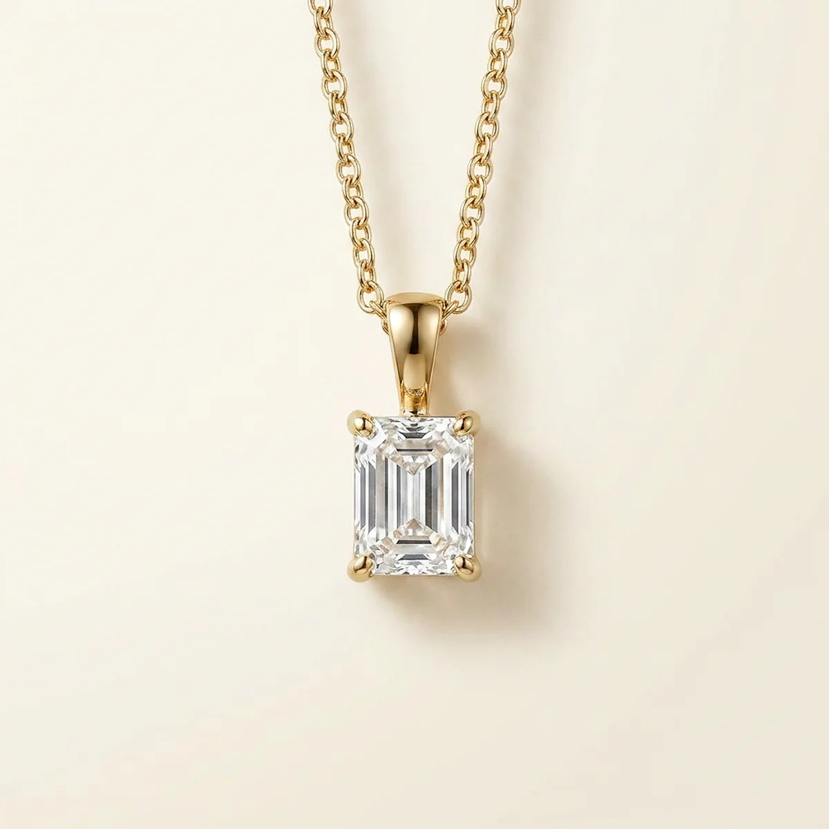 A .5ct colorless rectangular radiant diamond on a yellow gold necklace, custom-designed by Eterneva to honor the remarkable Terri.