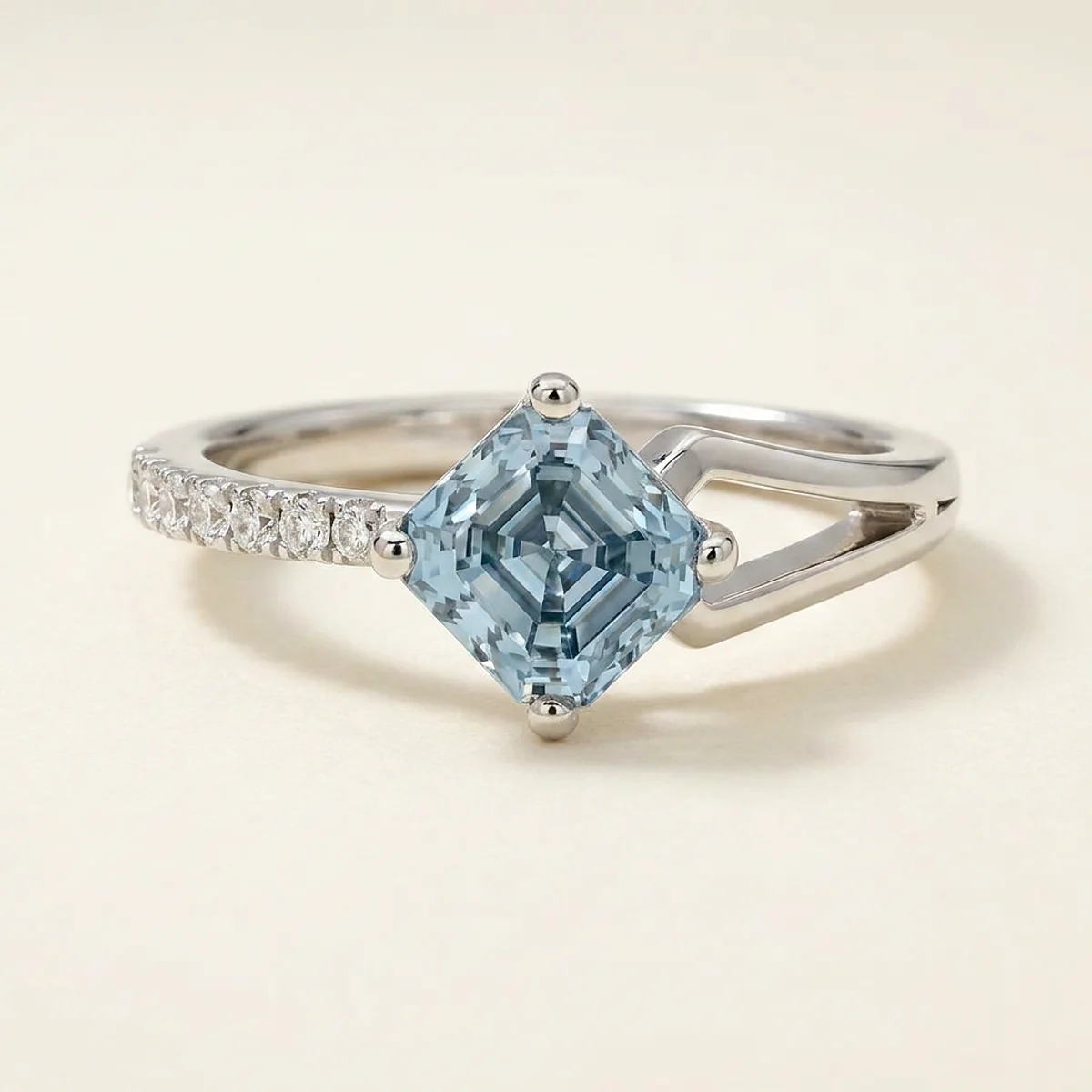 A 1ct blue asscher diamond on a platinum ring, custom-designed by Eterneva to honor the remarkable Lynn.