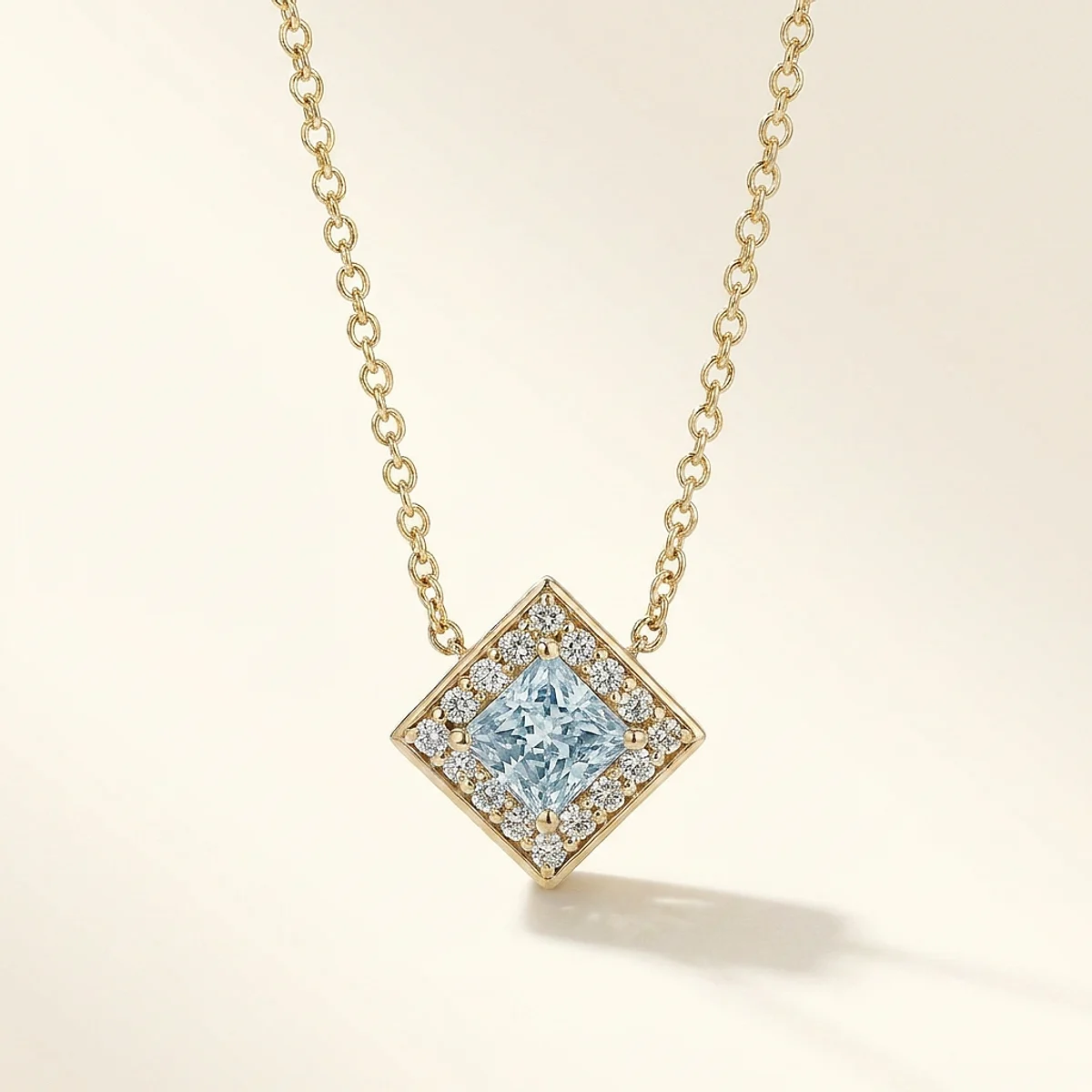 A .5ct blue princess diamond on a yellow gold necklace, custom-designed by Eterneva to honor the remarkable Michael.