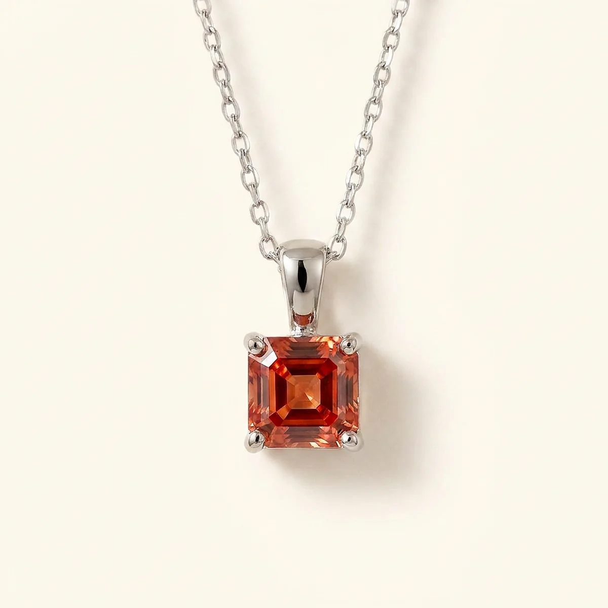 A .25ct pink asscher diamond on a white gold necklace, custom-designed by Eterneva to honor the remarkable Mitzy.