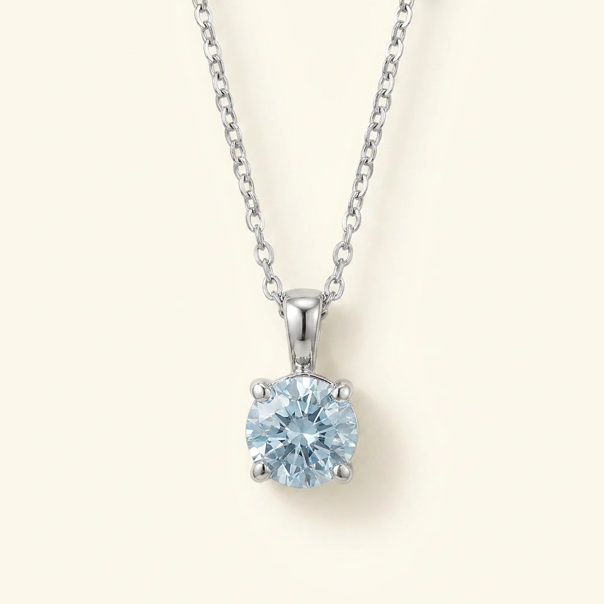 A .5ct blue round diamond on a white gold necklace, custom-designed by Eterneva to honor the remarkable Edward.