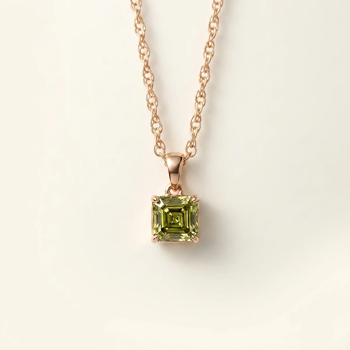 A .75ct green asscher diamond on a yellow gold pendant, custom-designed by Eterneva to honor the remarkable Ricki.