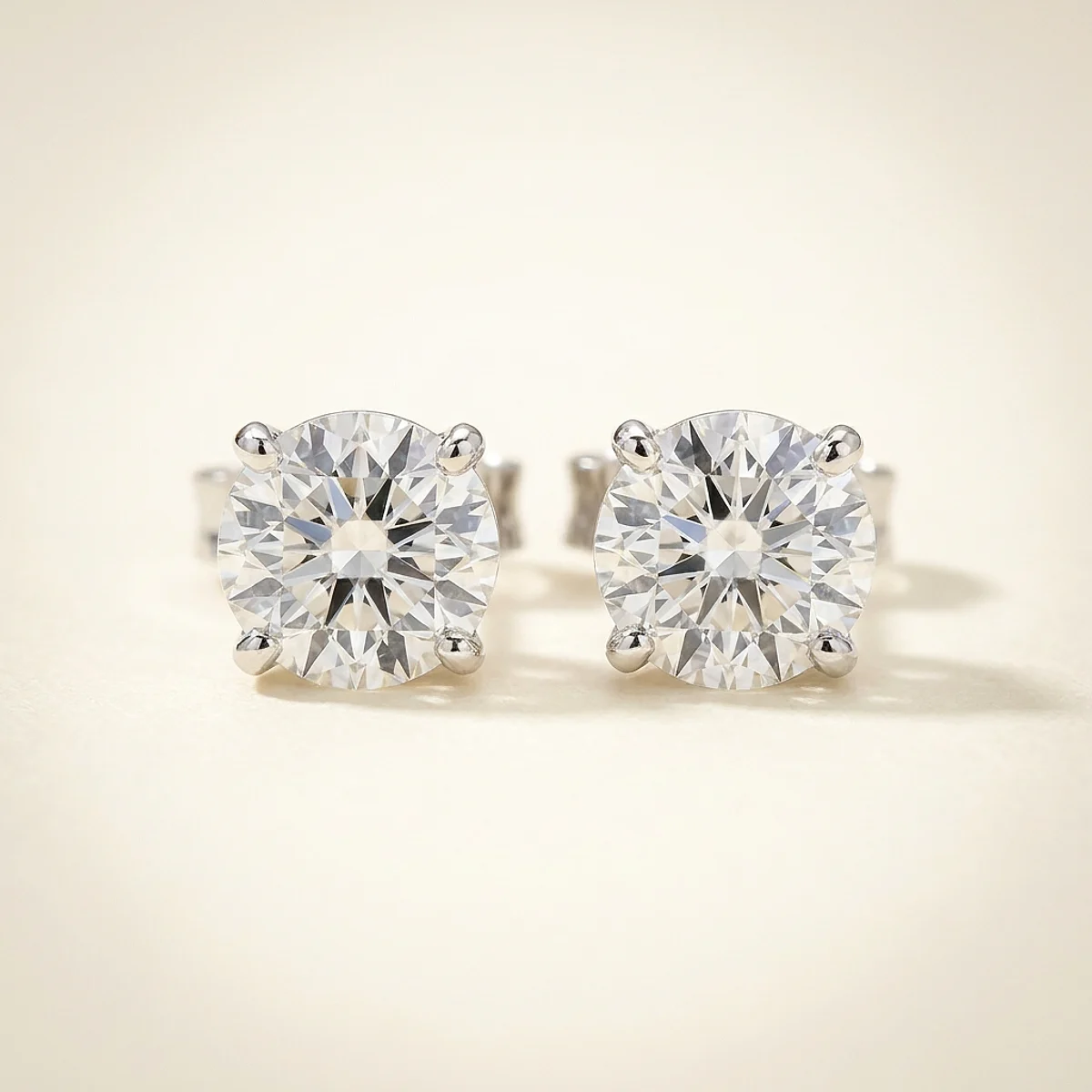 A .25ct colorless round diamond on white gold earrings, custom-designed by Eterneva to honor the remarkable Marjorie.