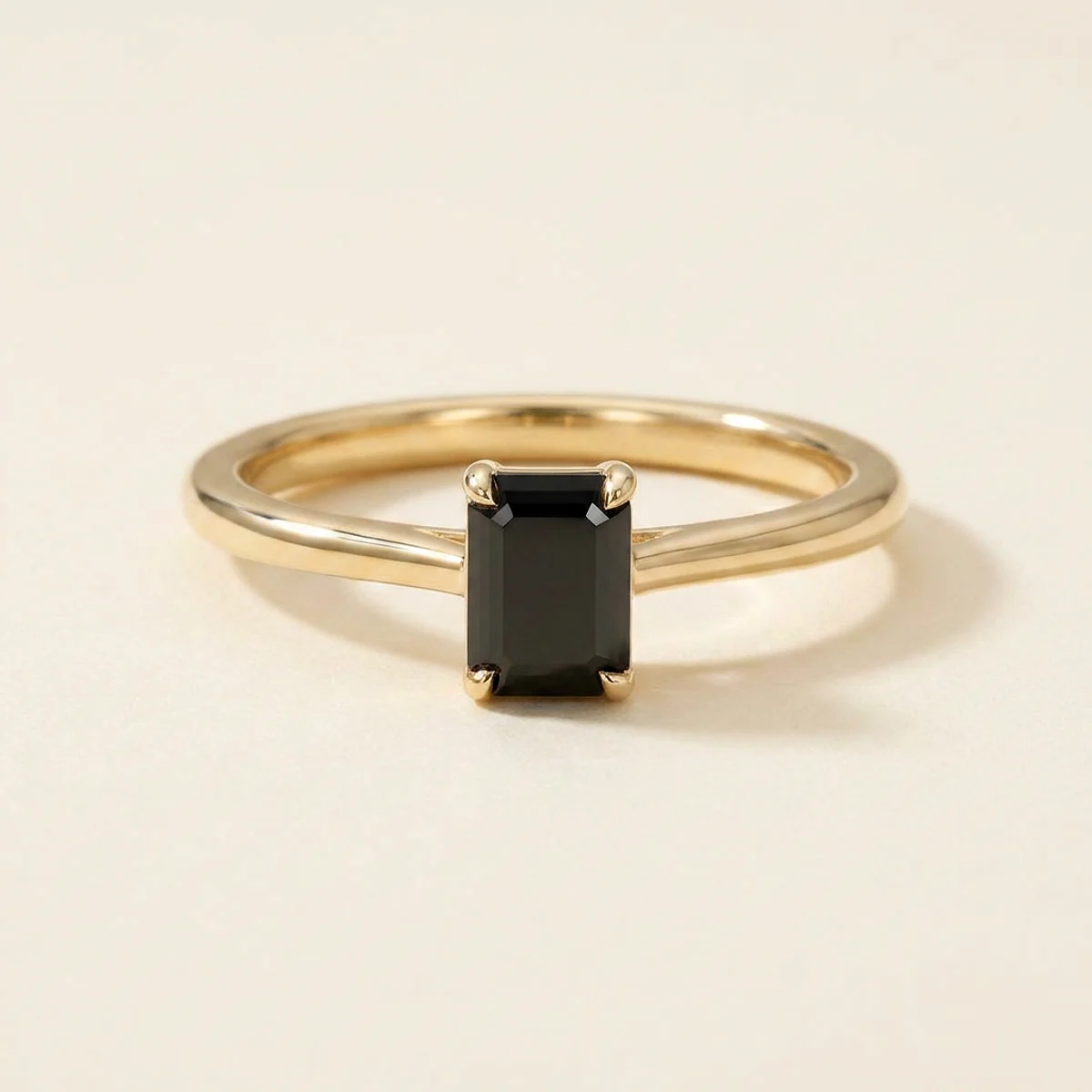 A .5ct black emerald diamond on a yellow gold ring, custom-designed by Eterneva to honor the remarkable Lola.