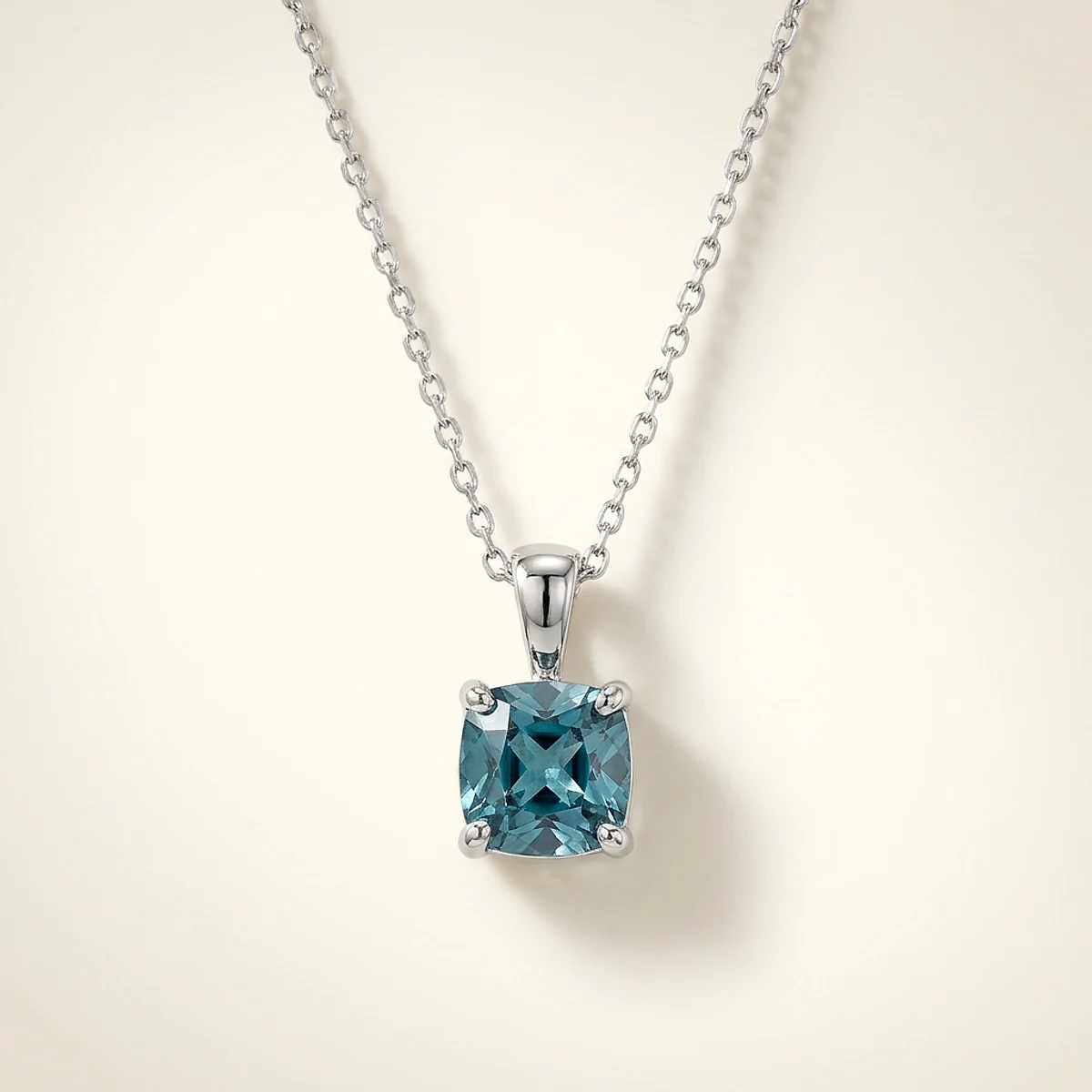 A .5ct blue cushion diamond on a white gold necklace, custom-designed by Eterneva to honor the remarkable Ross.