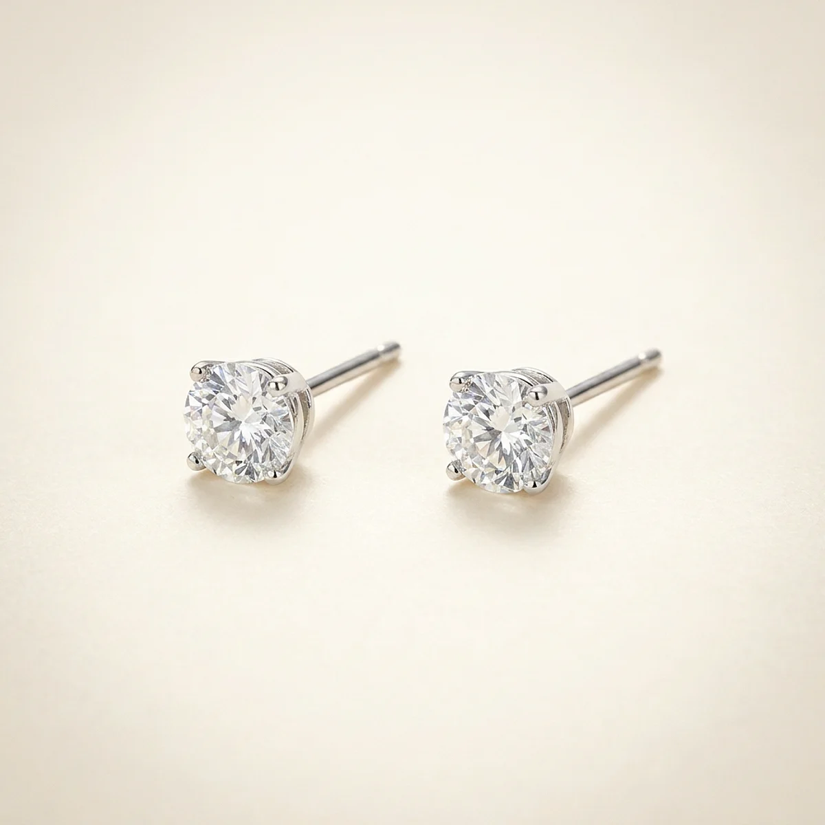 A .25ct colorless round diamond on white gold earrings, custom-designed by Eterneva to honor the remarkable Donald.