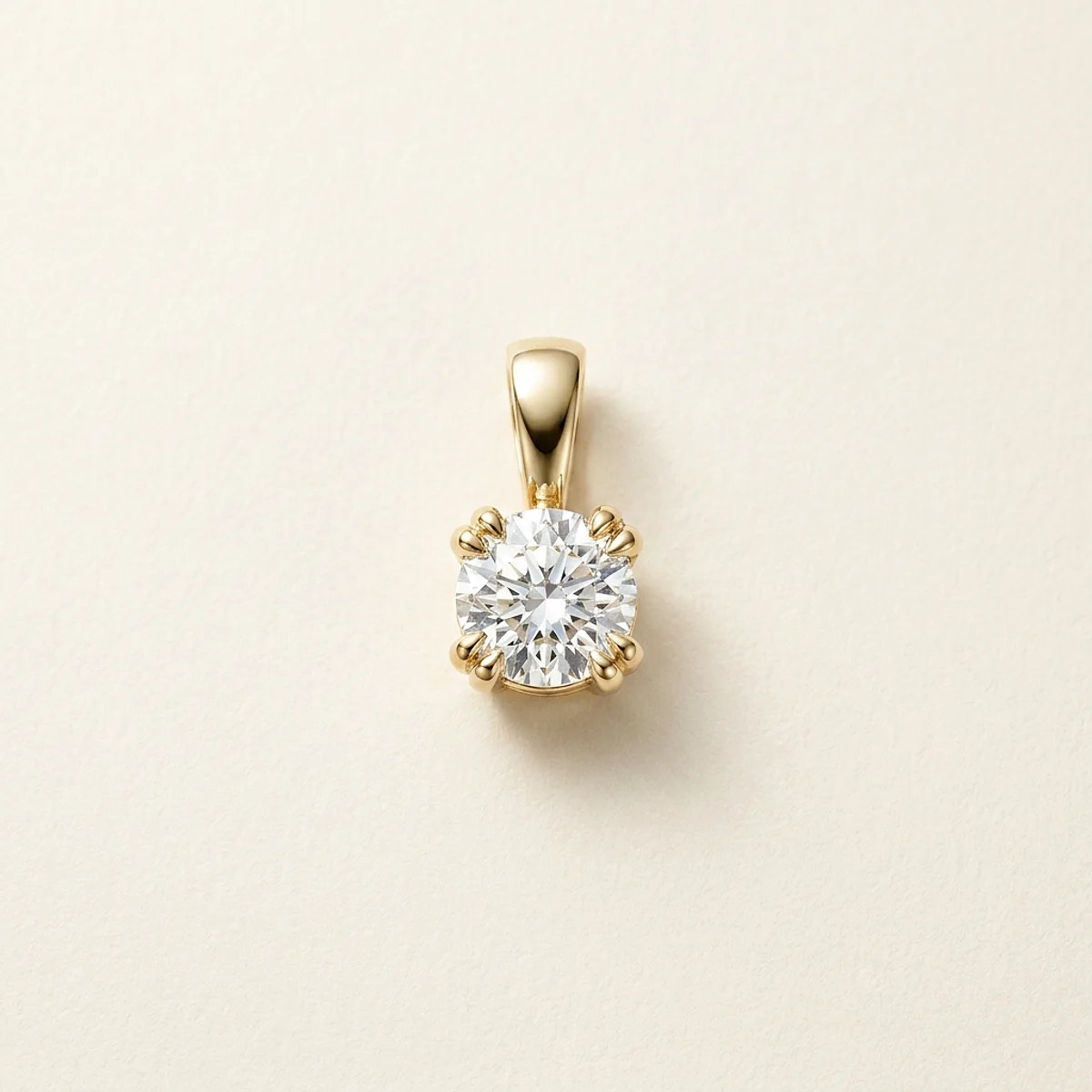 A .4ct colorless round diamond on a yellow gold pendant, custom-designed by Eterneva to honor the remarkable Karsten.