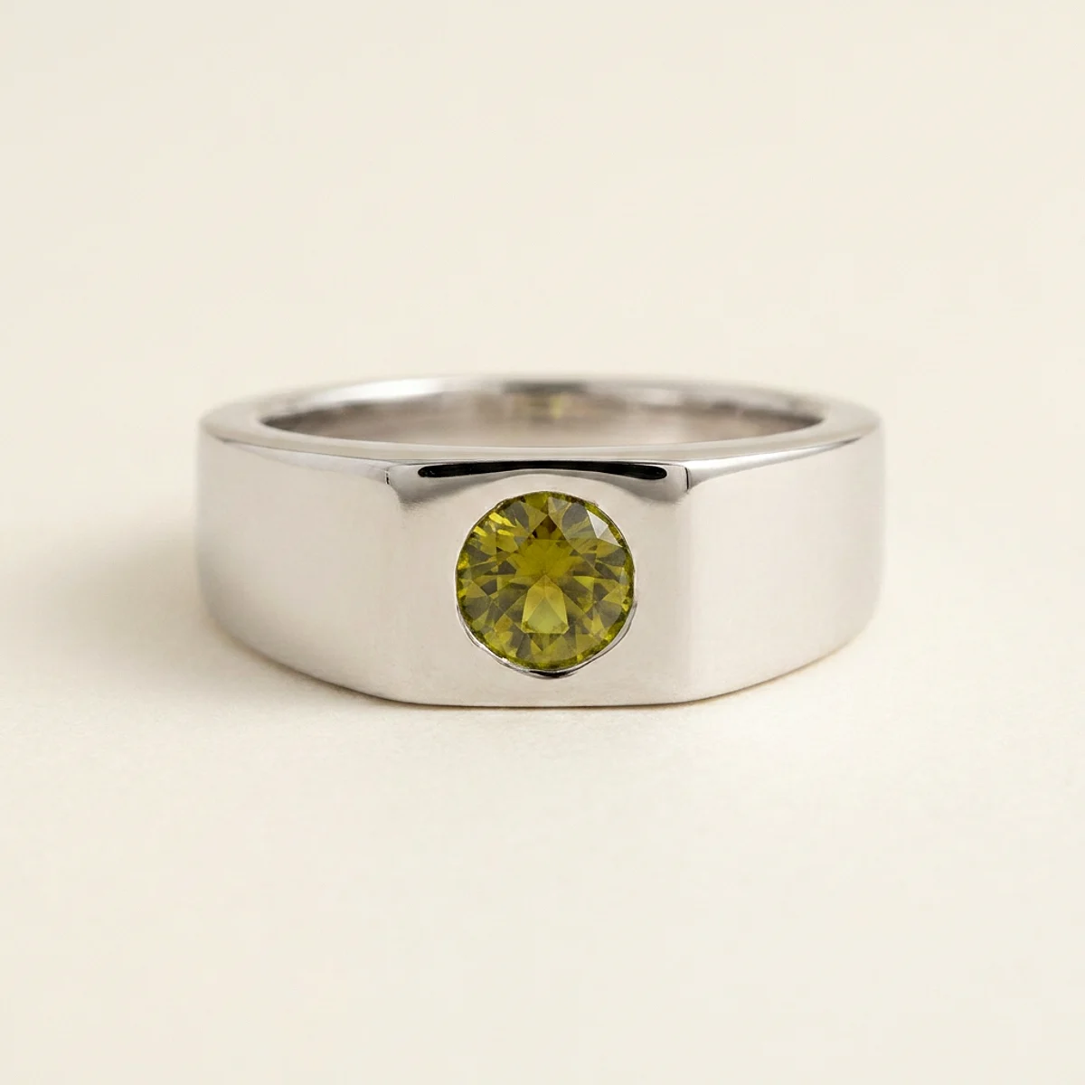 A .5ct green round diamond on a white gold ring, custom-designed by Eterneva to honor the remarkable James.