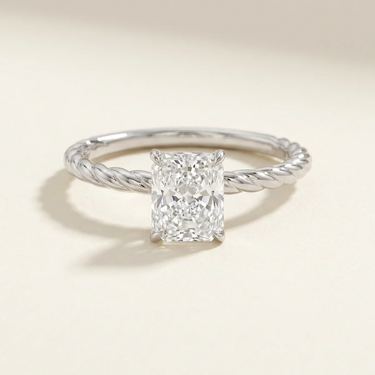 A 1ct colorless rectangular radiant diamond on a white gold ring, custom-designed by Eterneva to honor the remarkable Ethan.