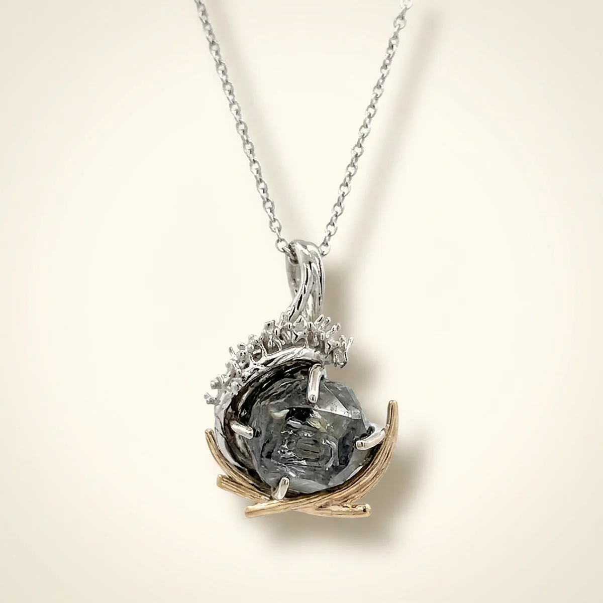 A .5ct blue rough diamond on a mixed metal pendant, custom-designed by Eterneva to honor the remarkable William.