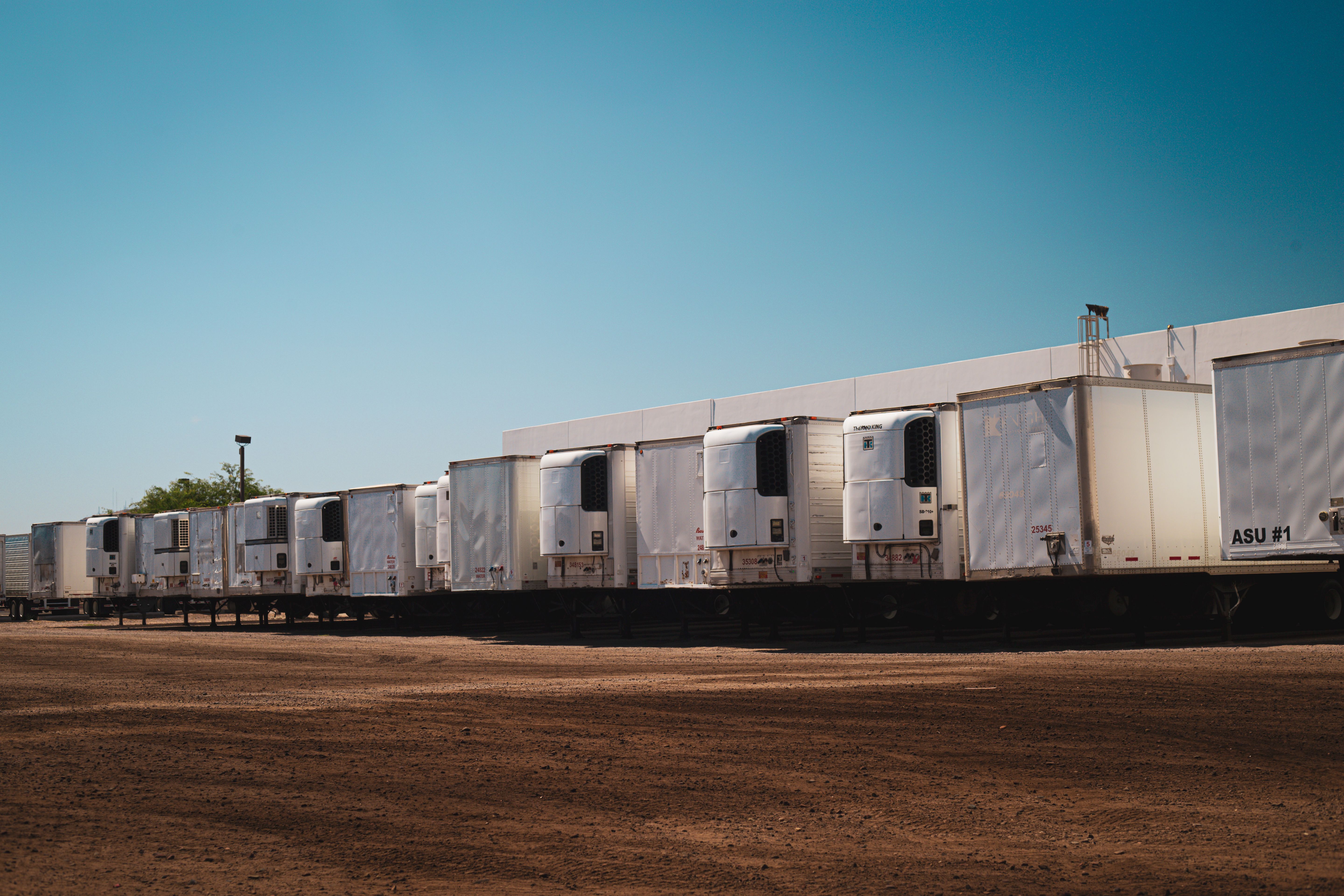 Trailers parked in the outdoor yard at TradeSpace Edmonton