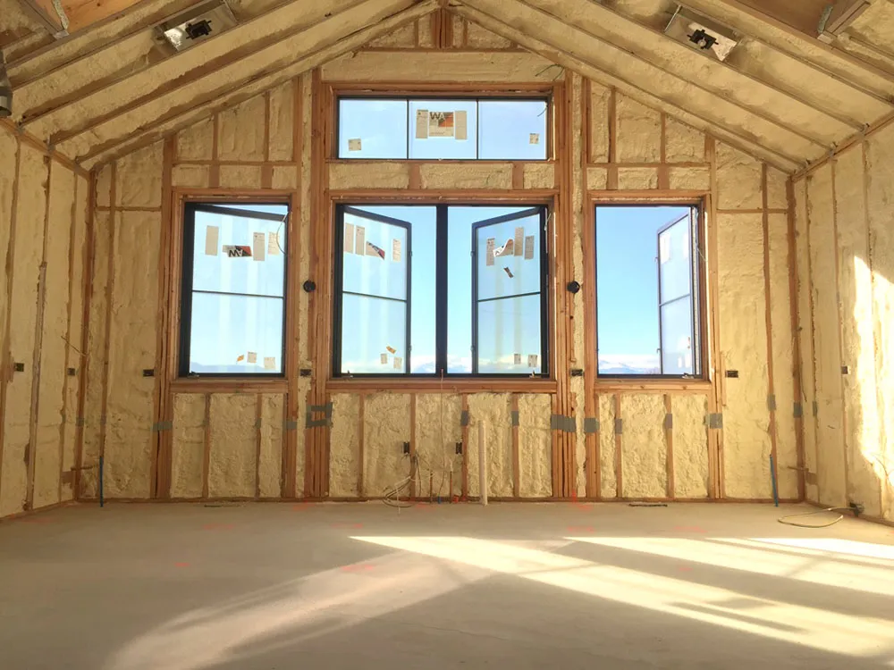 Spray foam insulation in custom home.