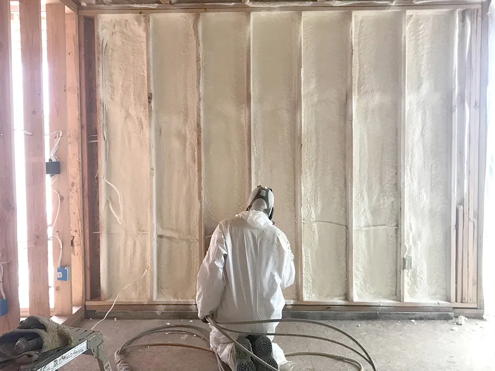 Titan applicator installing spray foam in Loveland, CO home