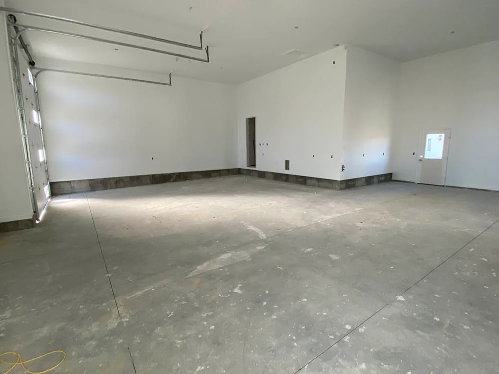 Garage epoxy floor coating before.