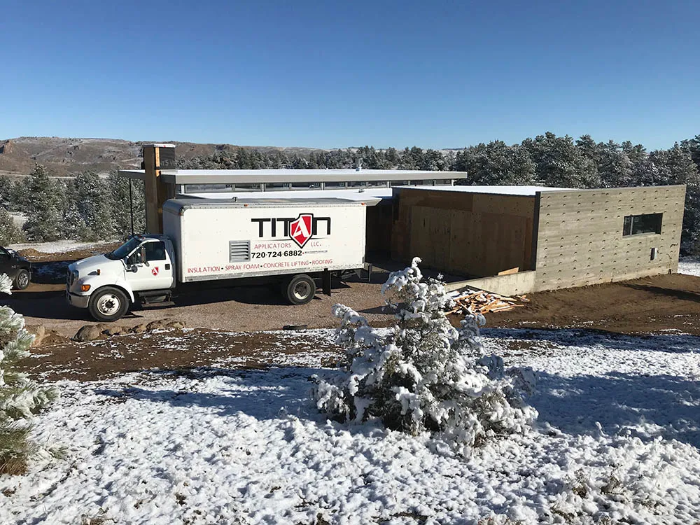 Titan truck at Red Feather Lake custom home.