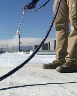 spray foam installer on roof