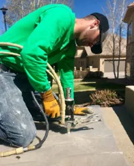 installer performing concrete repair work