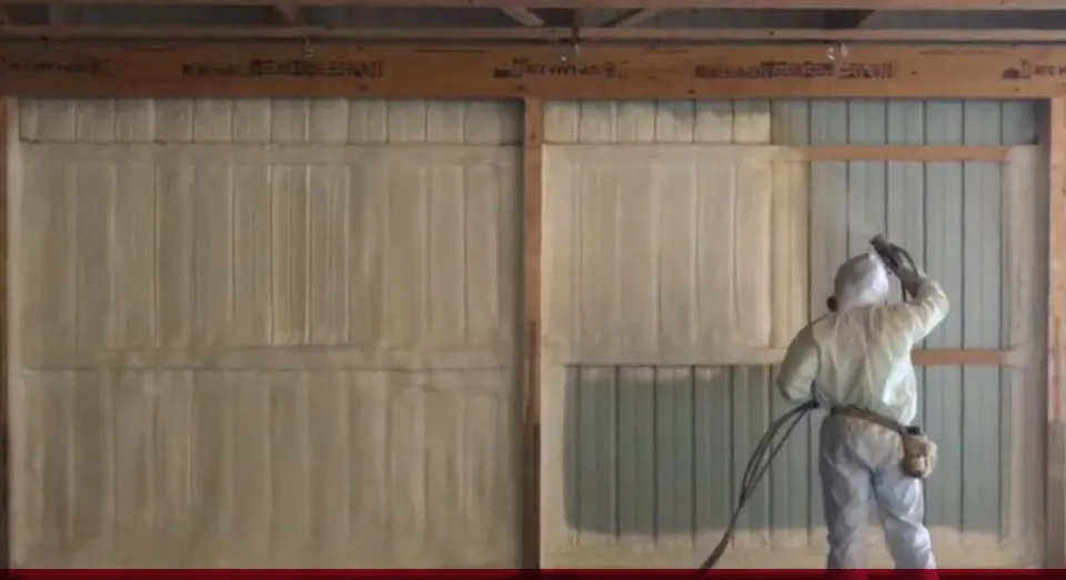 titan spray foam applicator installing foam insulation in metal building