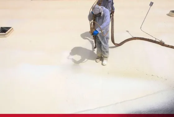 titan team installing new silicone roof coating