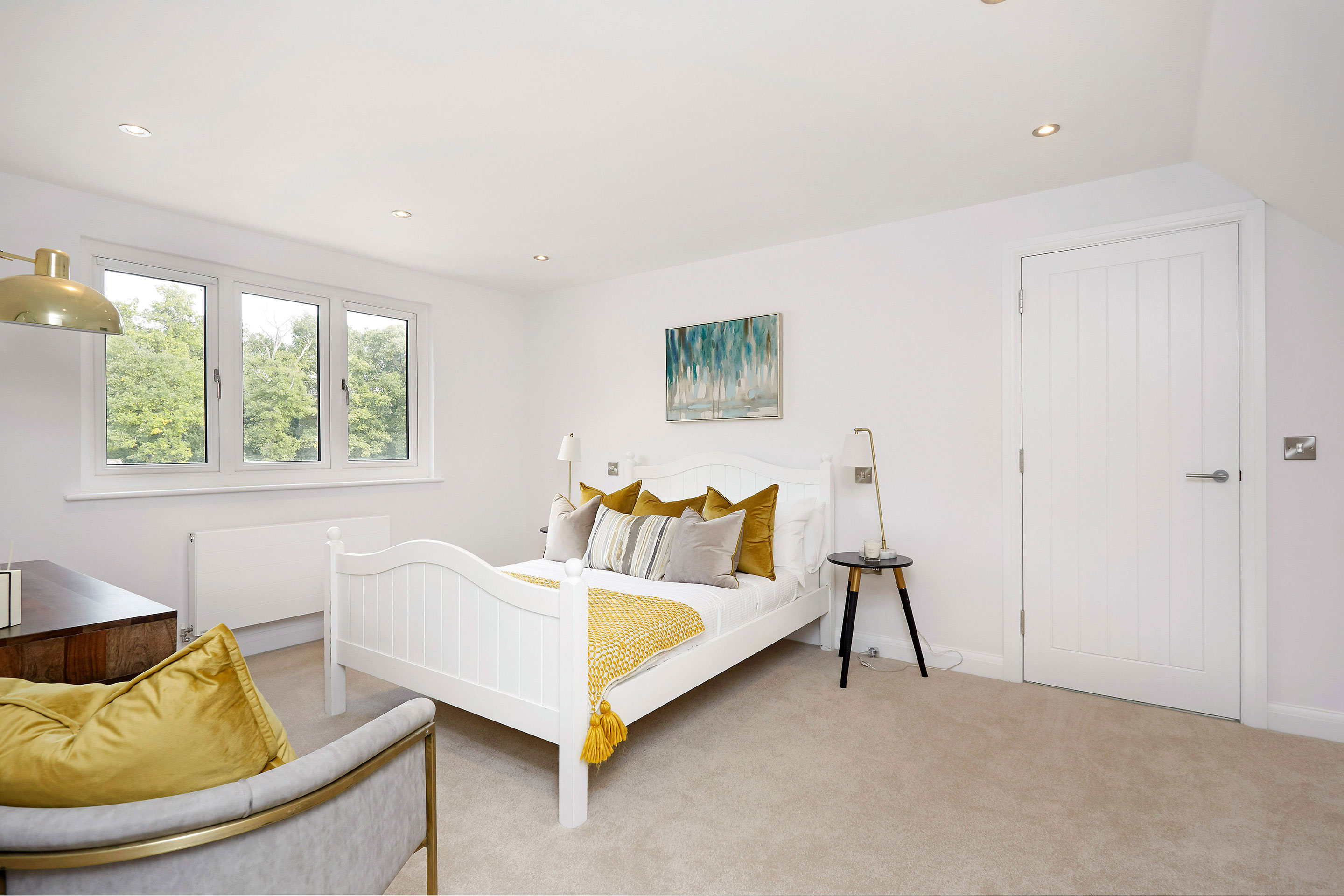 Styling bedroom with a double bed and view to the garden