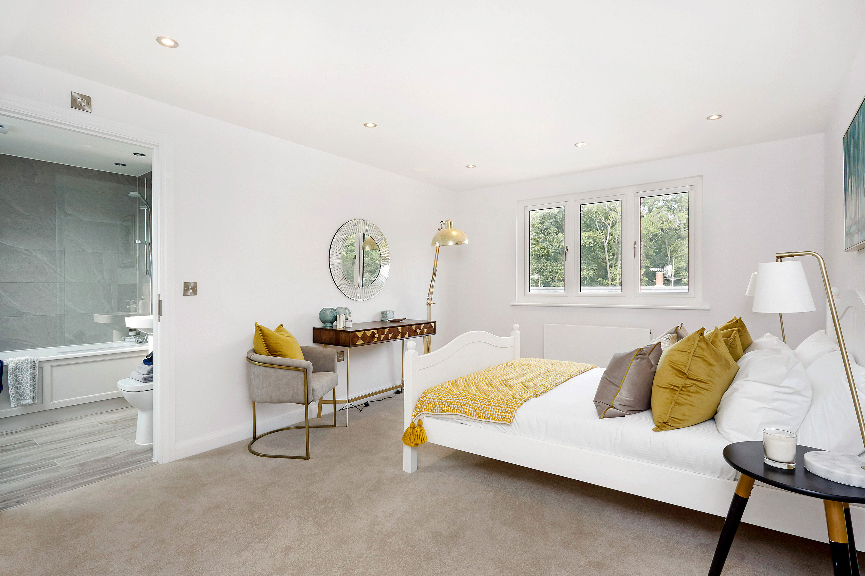 Styling bedroom with a view through to en-suite