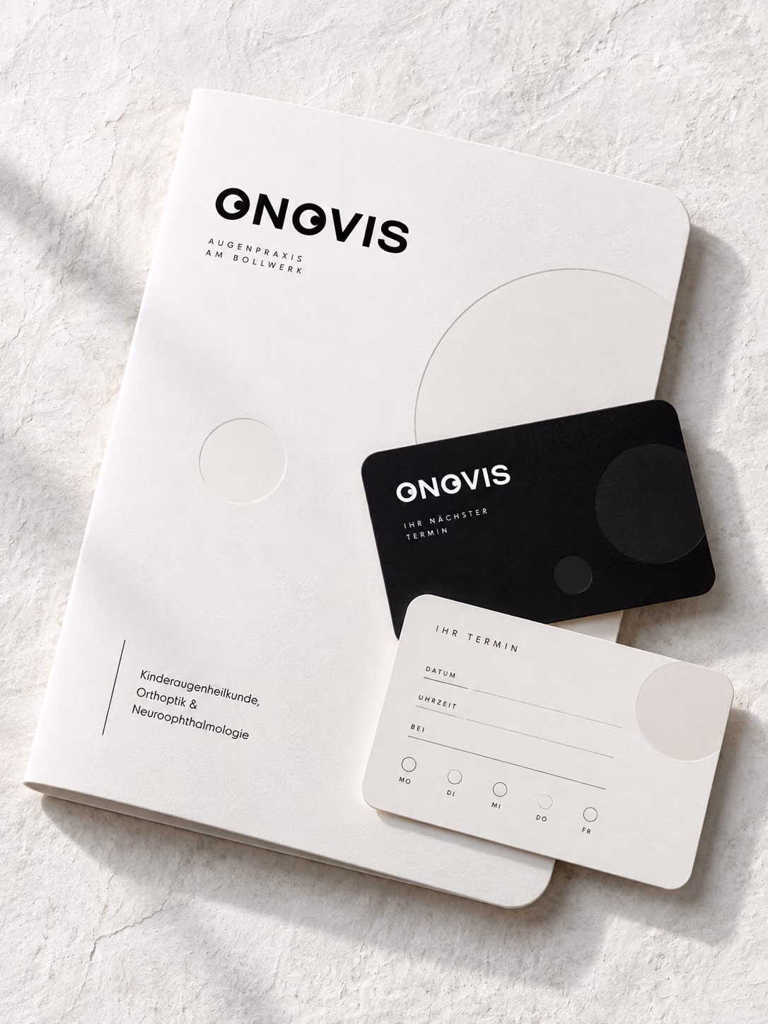Briefpapier und Visitenkarten im Branding der Augenarztpraxis Onovis