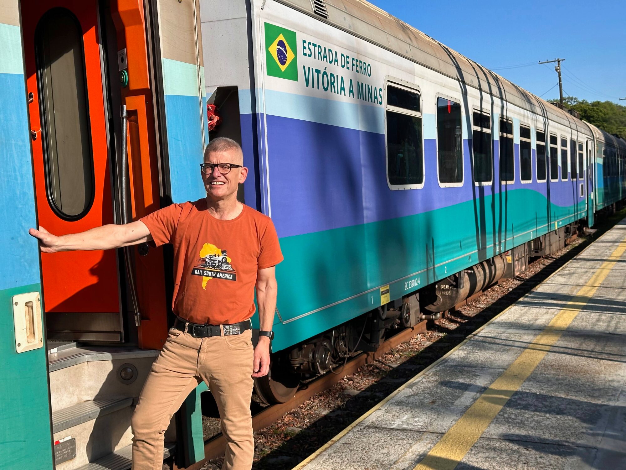 Boarding the Vitória–Minas passenger train at Pedro Nolasco station in Brazil