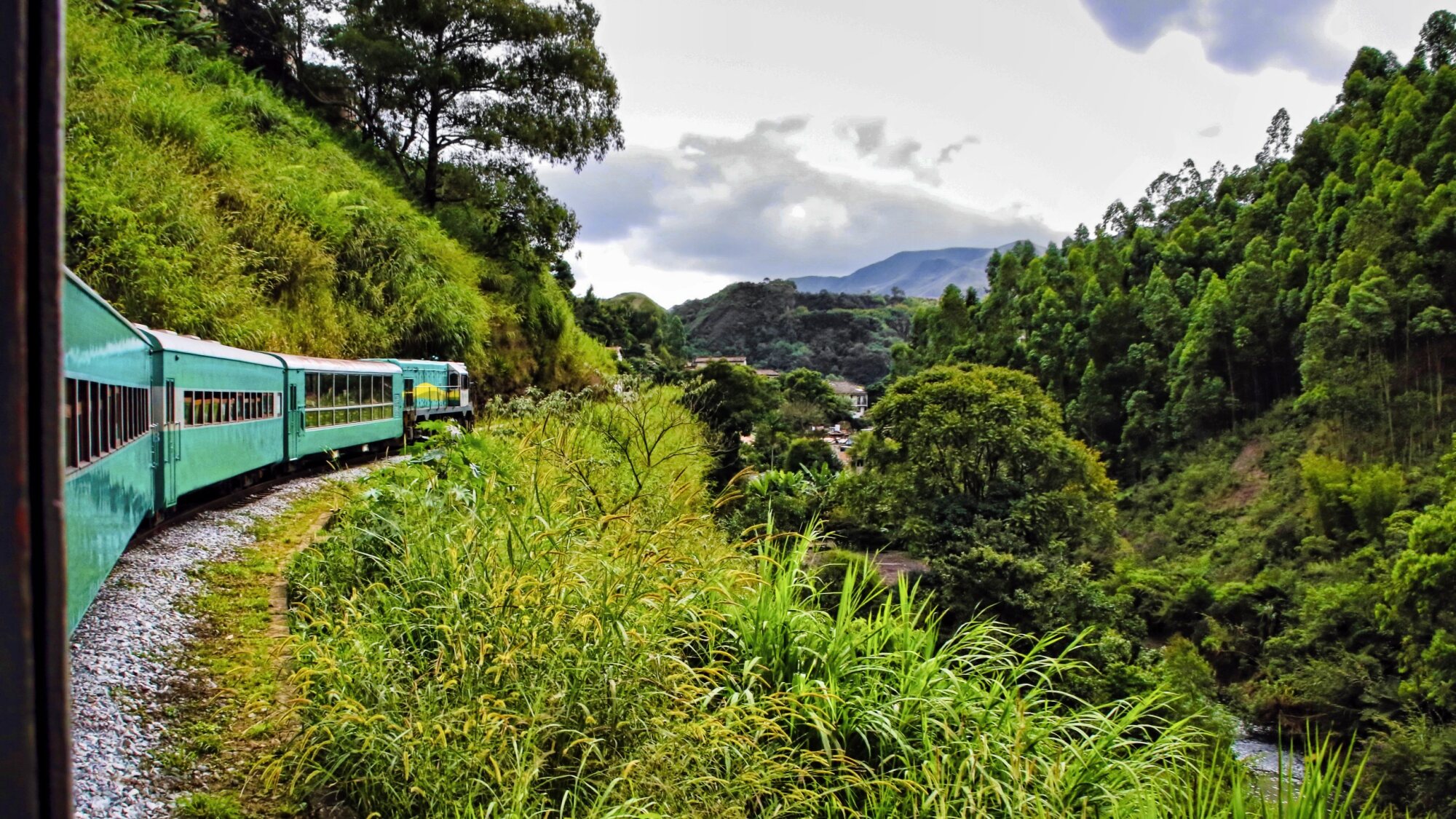 Ouro Preto–Mariana passenger train traveling through the mountains of Minas Gerais, Brazil