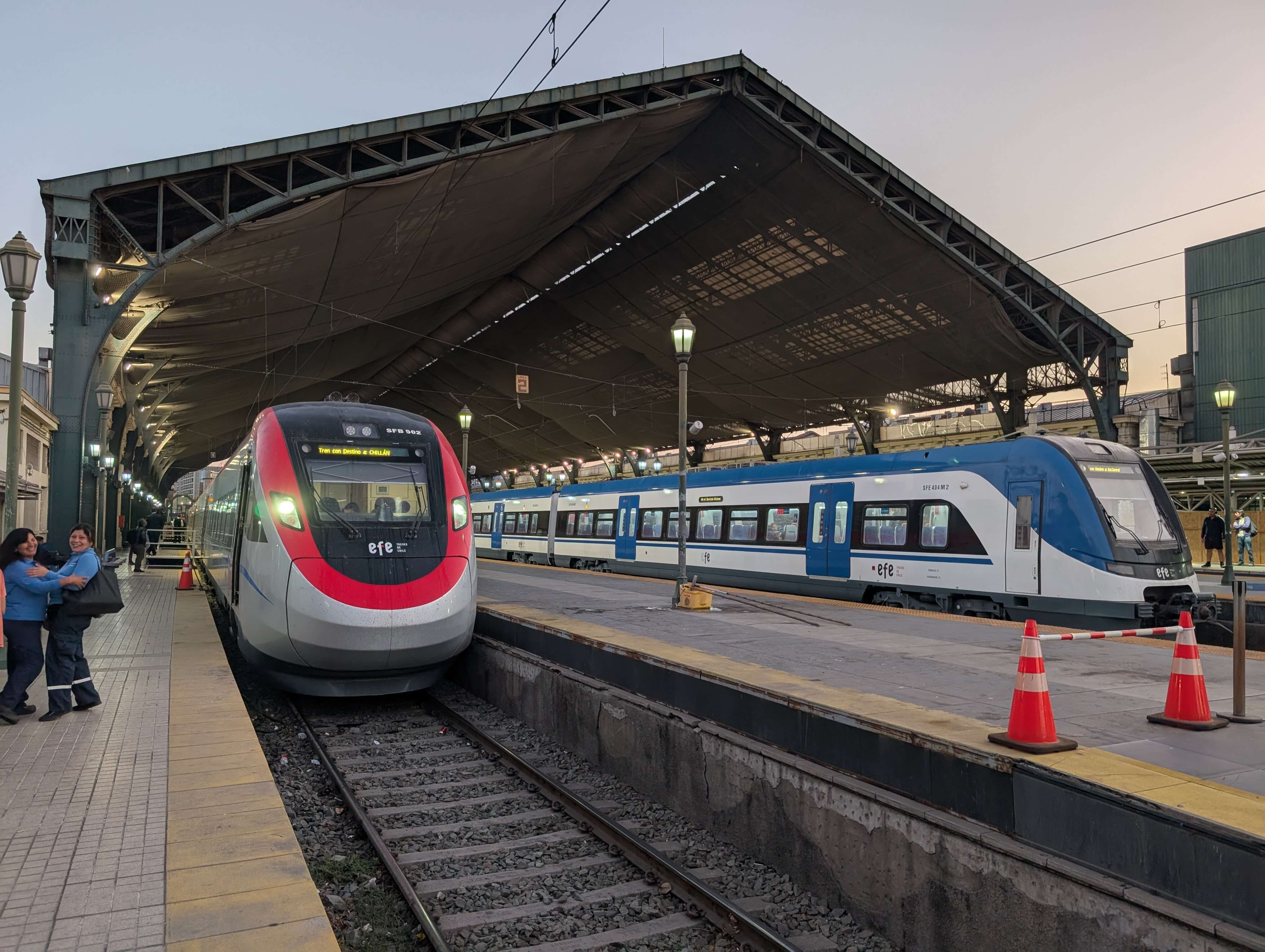 EFE passenger trains beneath the historic train shed at Alameda Railway Station in Santiago, Chile.
