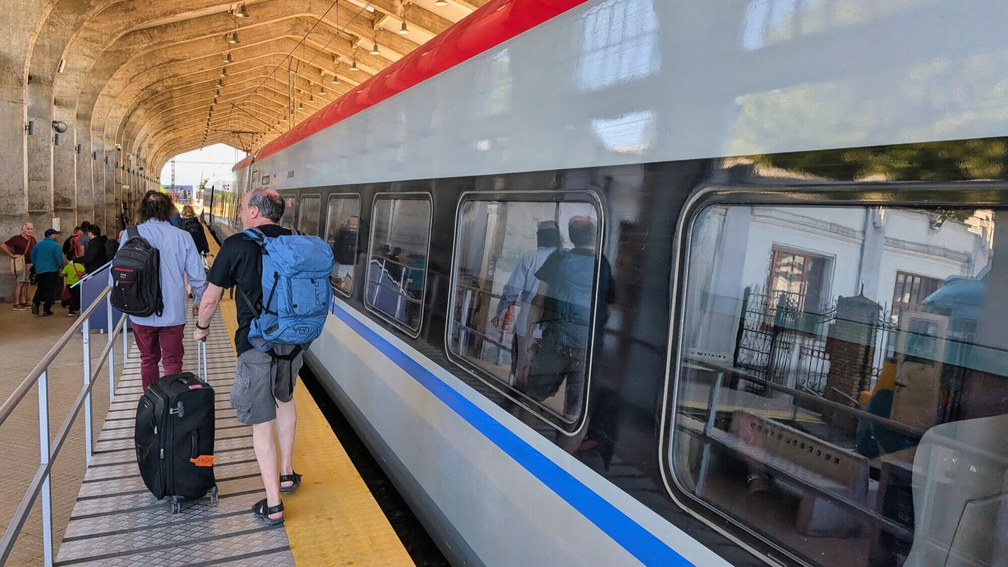 Passengers boarding an intercity train at Talca station in central Chile