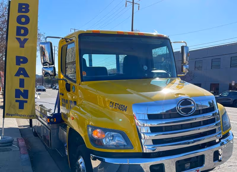 Flat bed Tow Truck, Regal Repair Towing Services