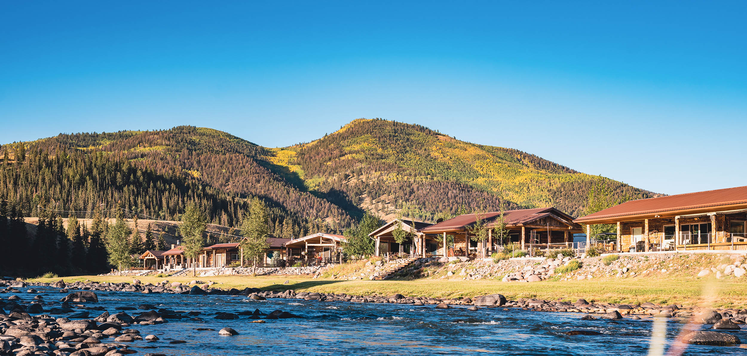 Cabins along the Rio Grande River at Rio Grande RV Resort, South Fork, Colorado