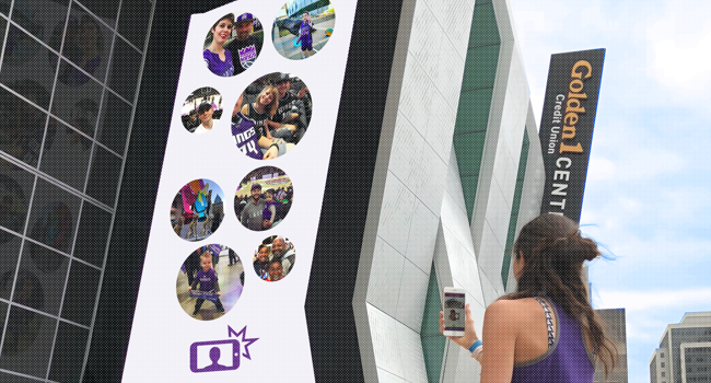 Kings fan watches as her selfie appears on the big screen