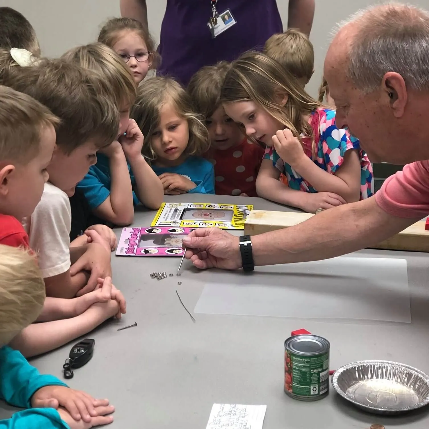 Four and Five years old playing with their teacher at Grace Lutheran Church
