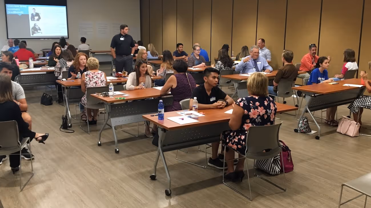 students meeting one-on-one with mentors