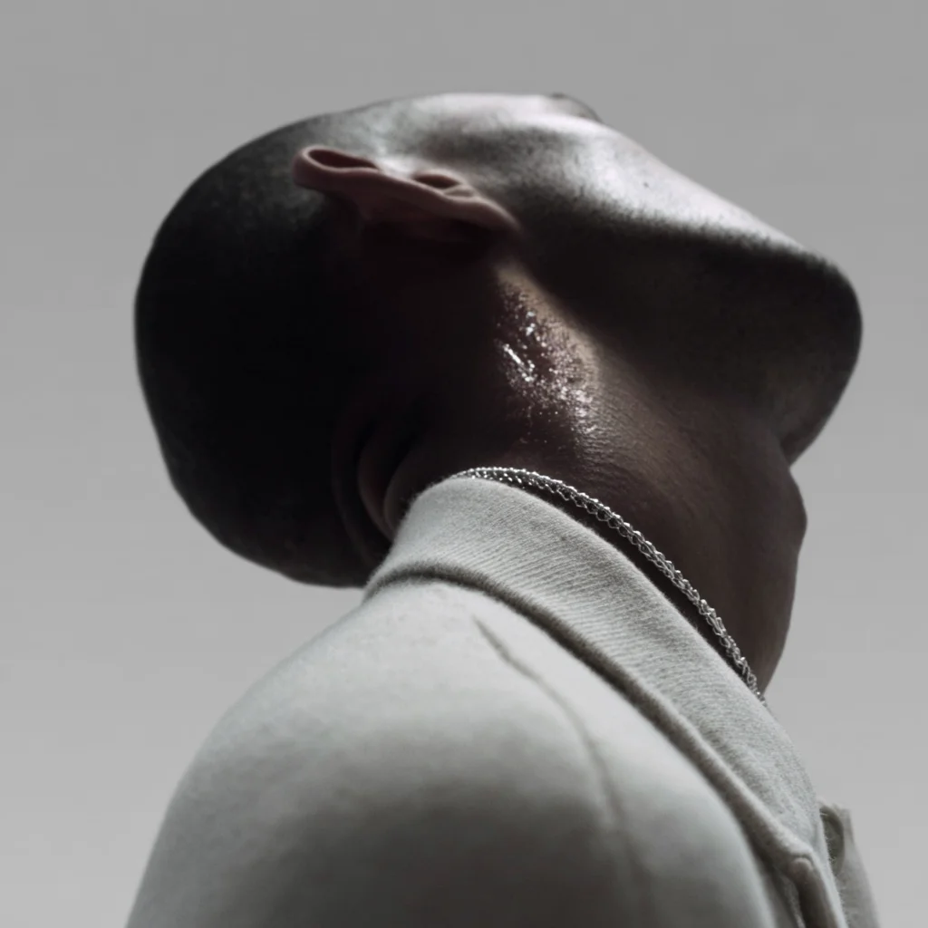 Head bowed forward showing the neck and upper spine, chiropractic care for disc issues and herniation in Central, Hong Kong