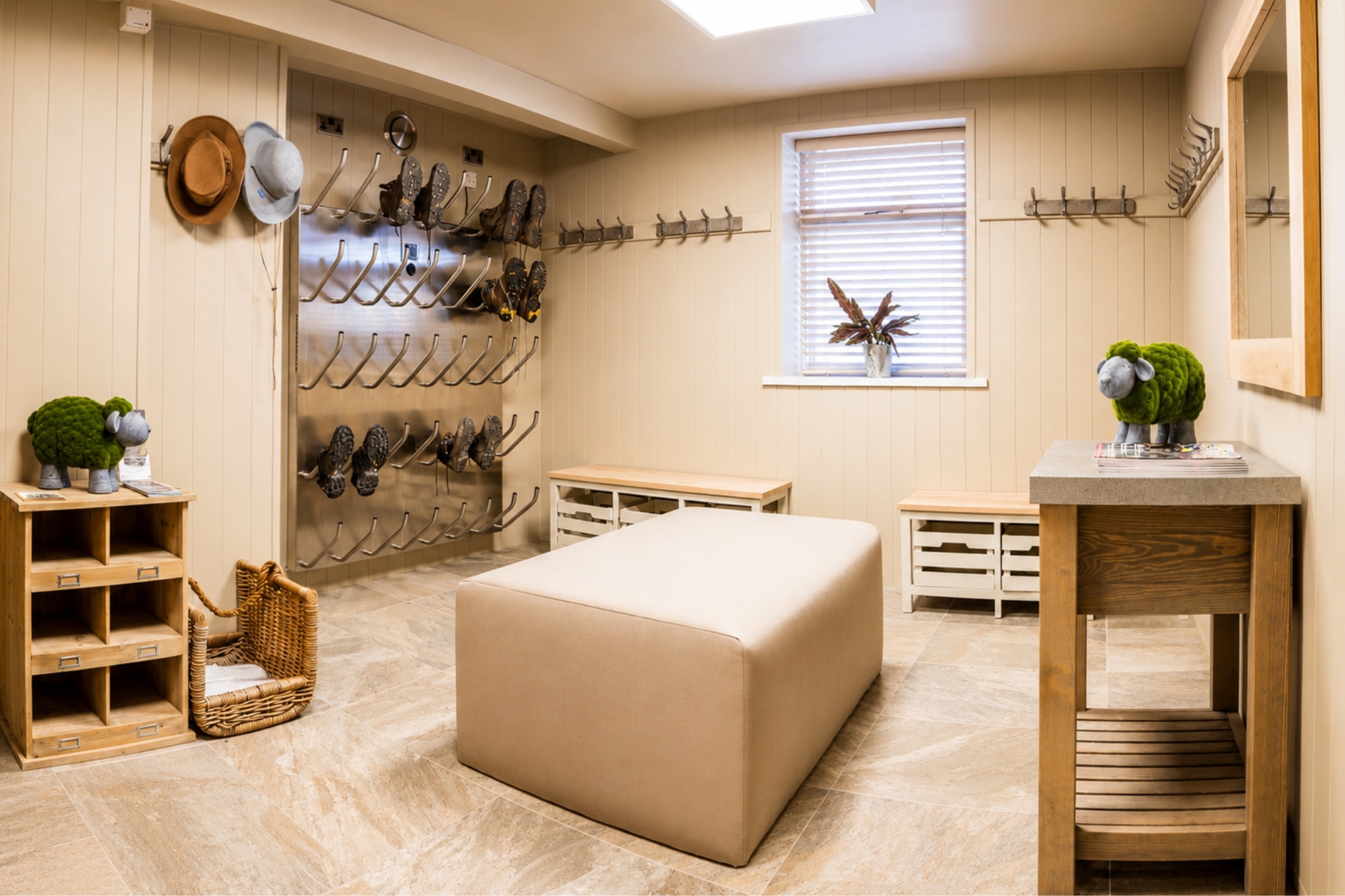 Dedicated walkers' boot room at The Grand at Grasmere featuring heated drying racks for walking boots and outdoor gear.