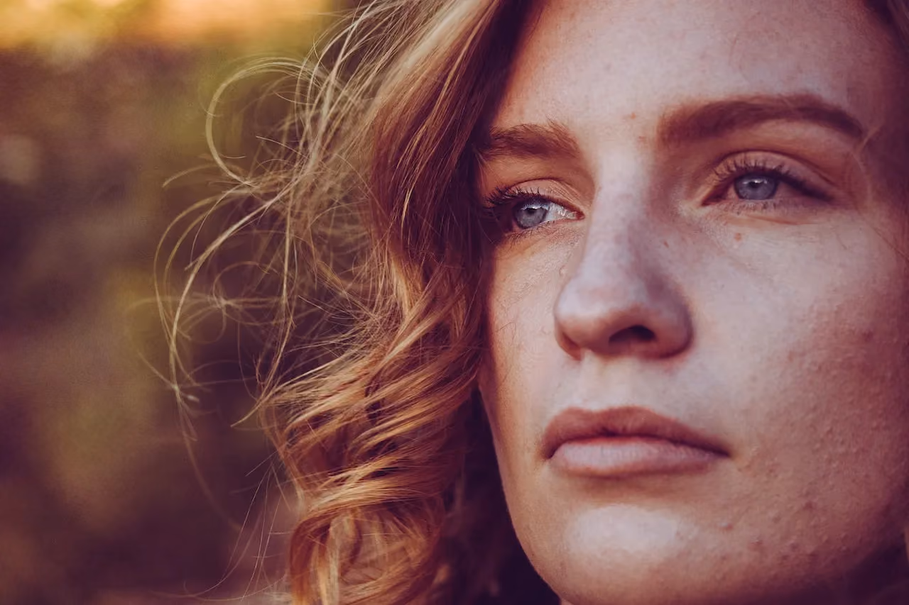 Close-up portrait of a woman with healthy-looking skin after skin rejuvenation treatment