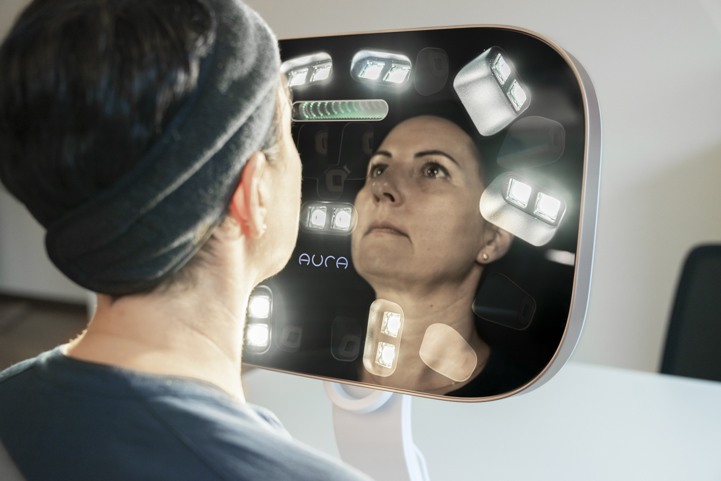 Client undergoing an Aura 3D Facial Analysis consultation