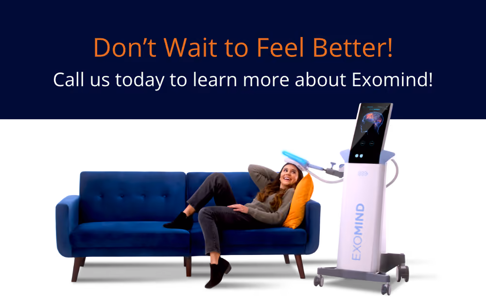 Person receiving Exomind treatment while relaxing on a couch beside the Exomind device
