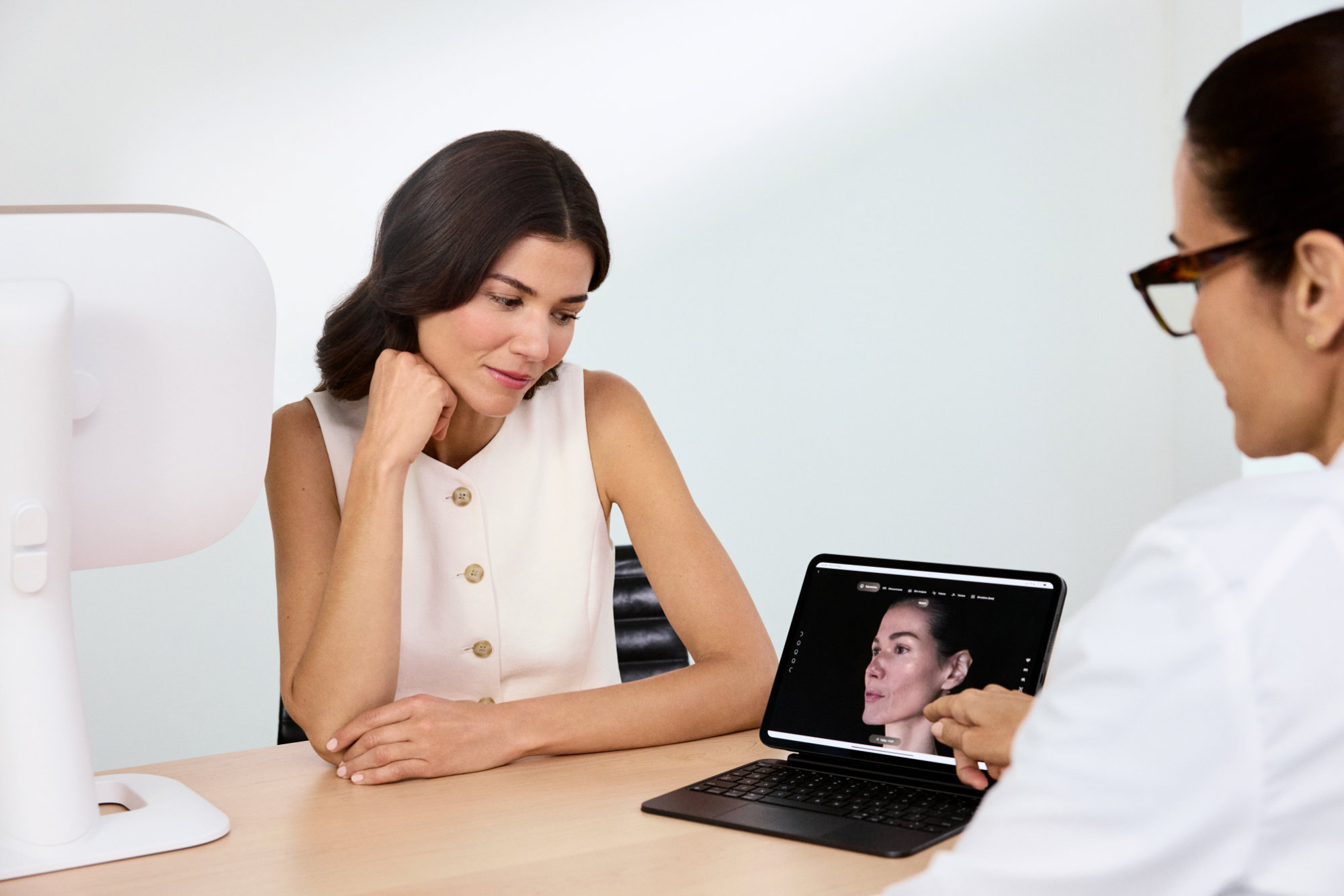 A patient consults their Aura specialist