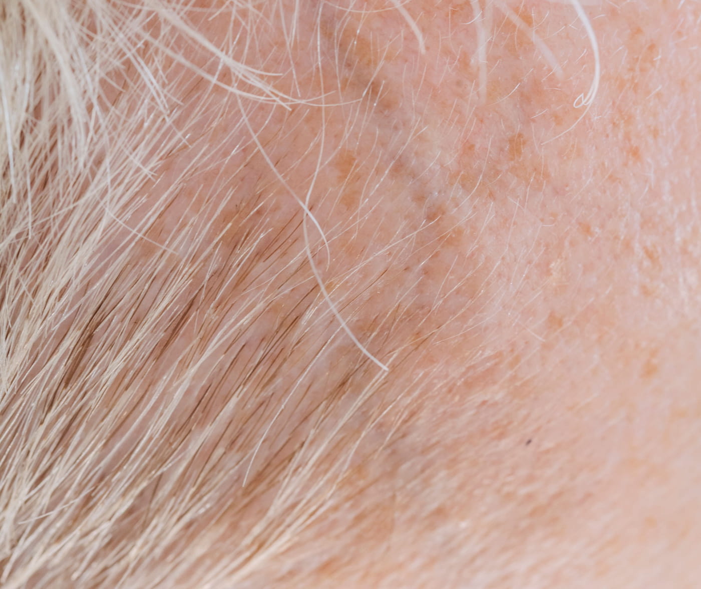 Image of a hand holding a long beautiful hair