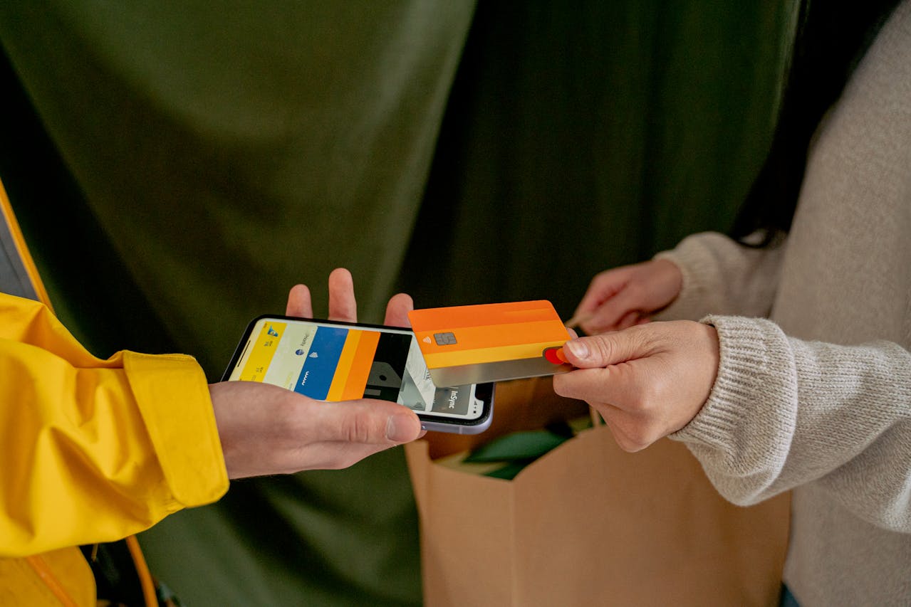 a person making a payment via card