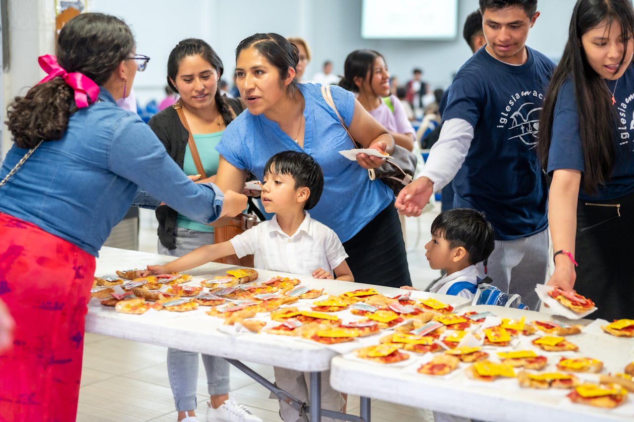 a group of adults and young kids attending a community event