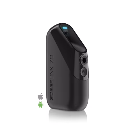 Compact black Soberlink 7.2 breathalyzer device with a power button and LED indicator light.