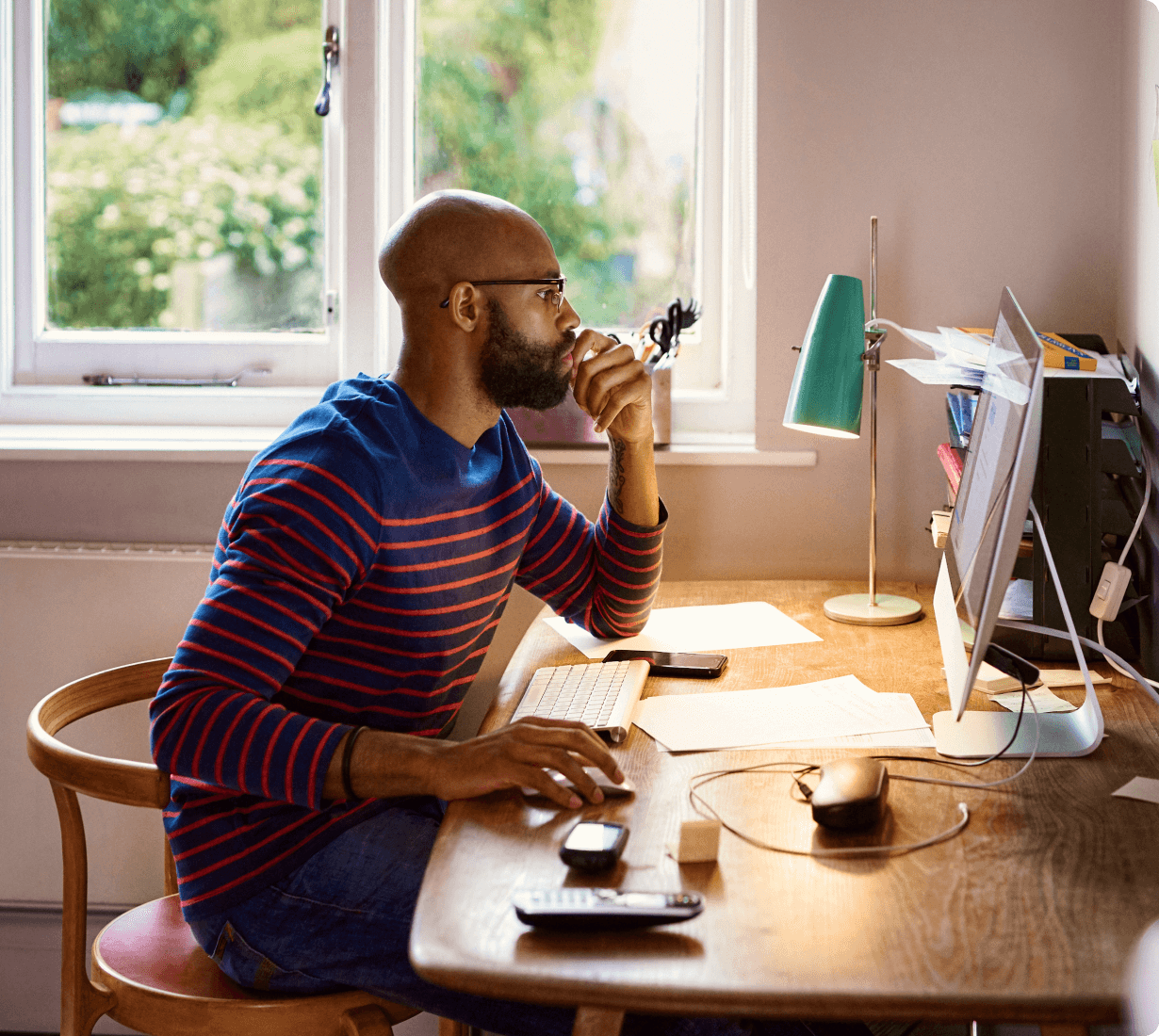 Man looking at a desktop