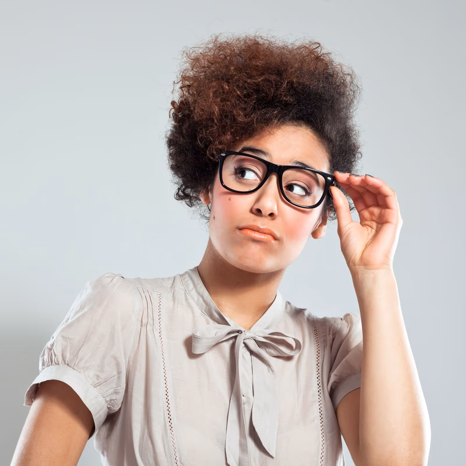Woman with glasses. Everything you need to know about appraisals, including what you can expect when you refinance through a government program.